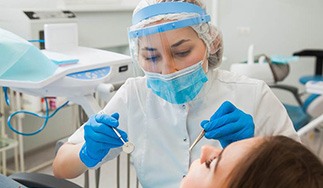 San Antonio implant denture dentist working on patient