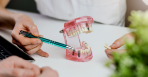 a patient during their dental implant consultation